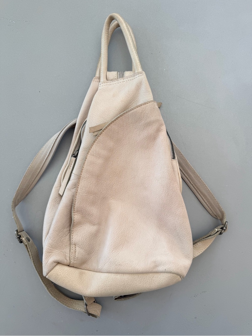 We The Free Cream Leather Sling Backpack